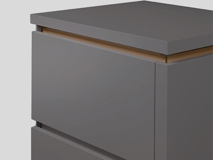Meuble bas gris à deux tiroirs, gorge intégrée bronze métallique entre les deux façades